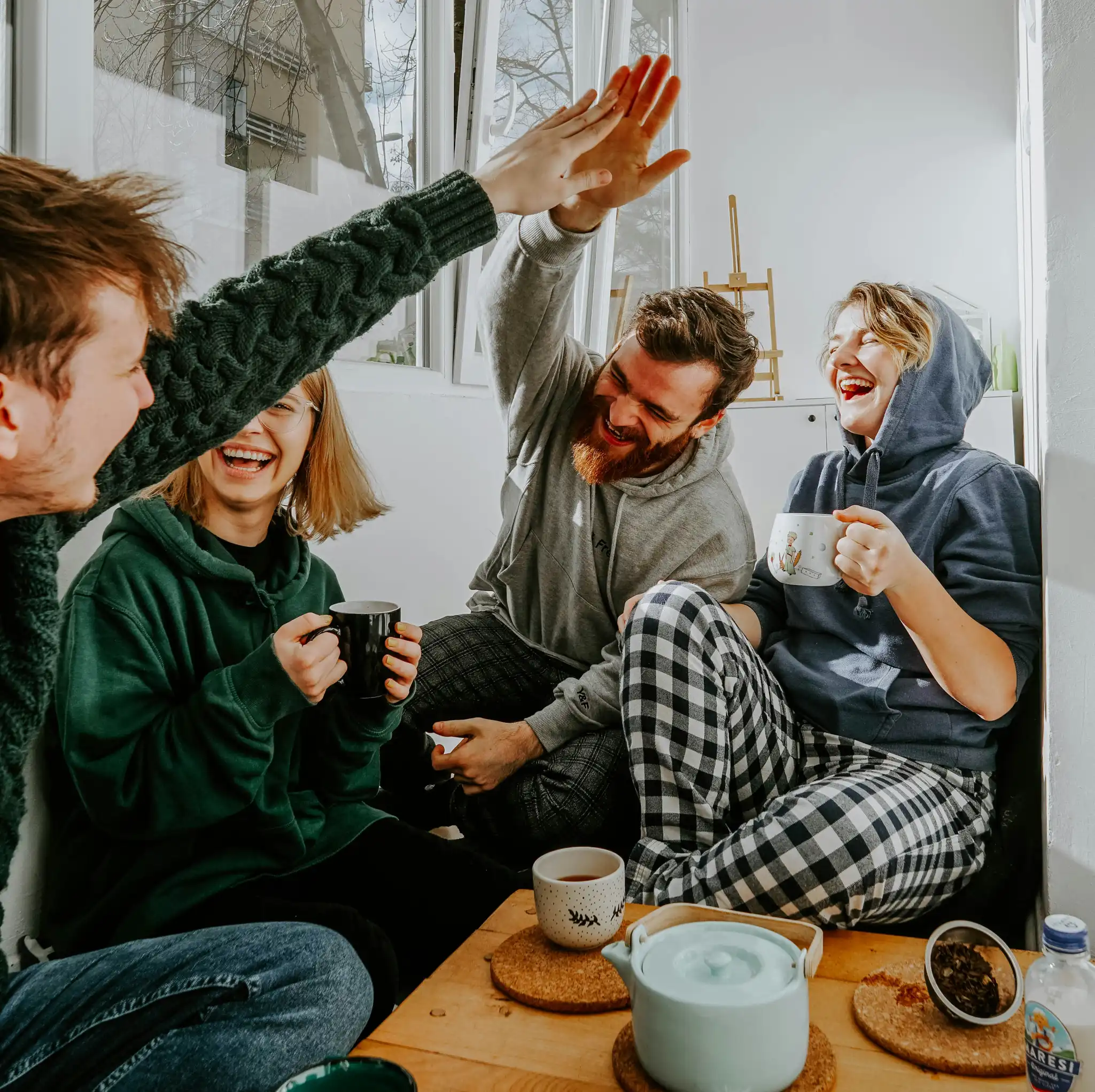 Group of people in a circle discussing their goals and progress